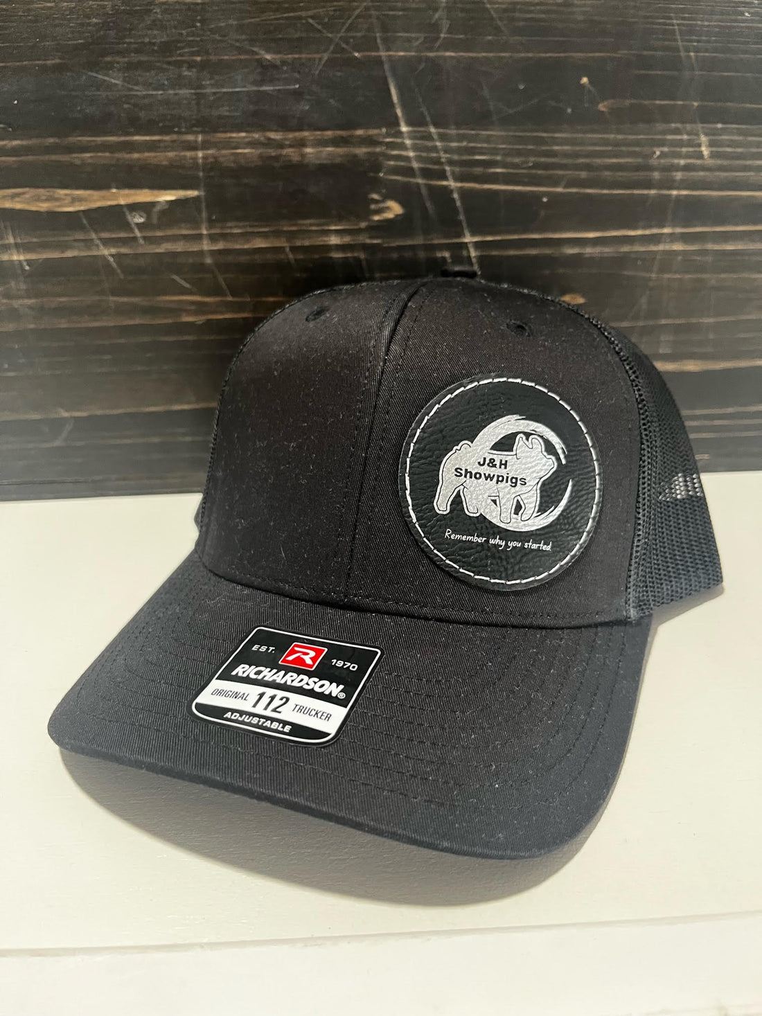 J&H Showpigs Hat—black with black circle patch
