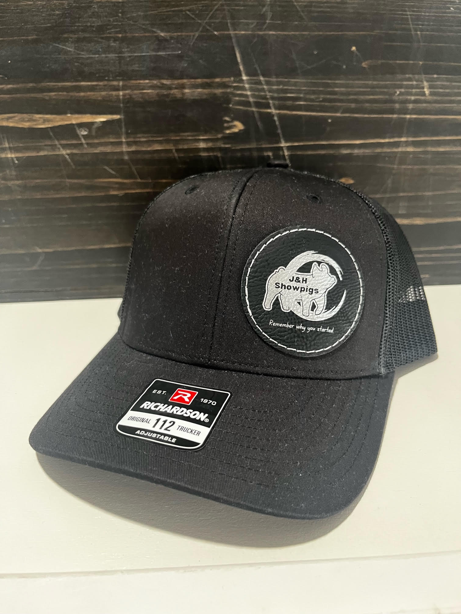 J&H Showpigs Hat—black with black circle patch