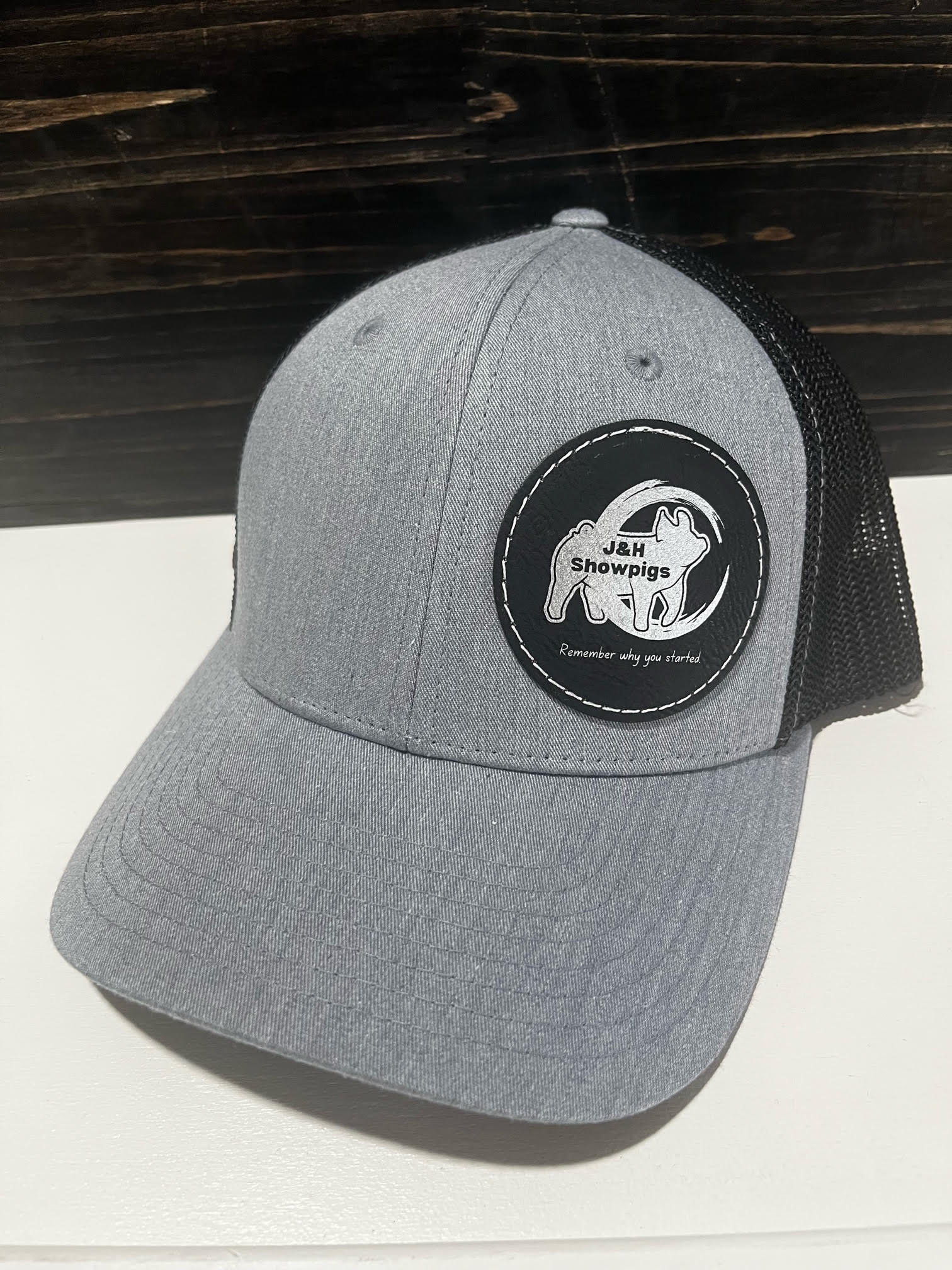 J&H Showpigs Hat—gray with black circle patch